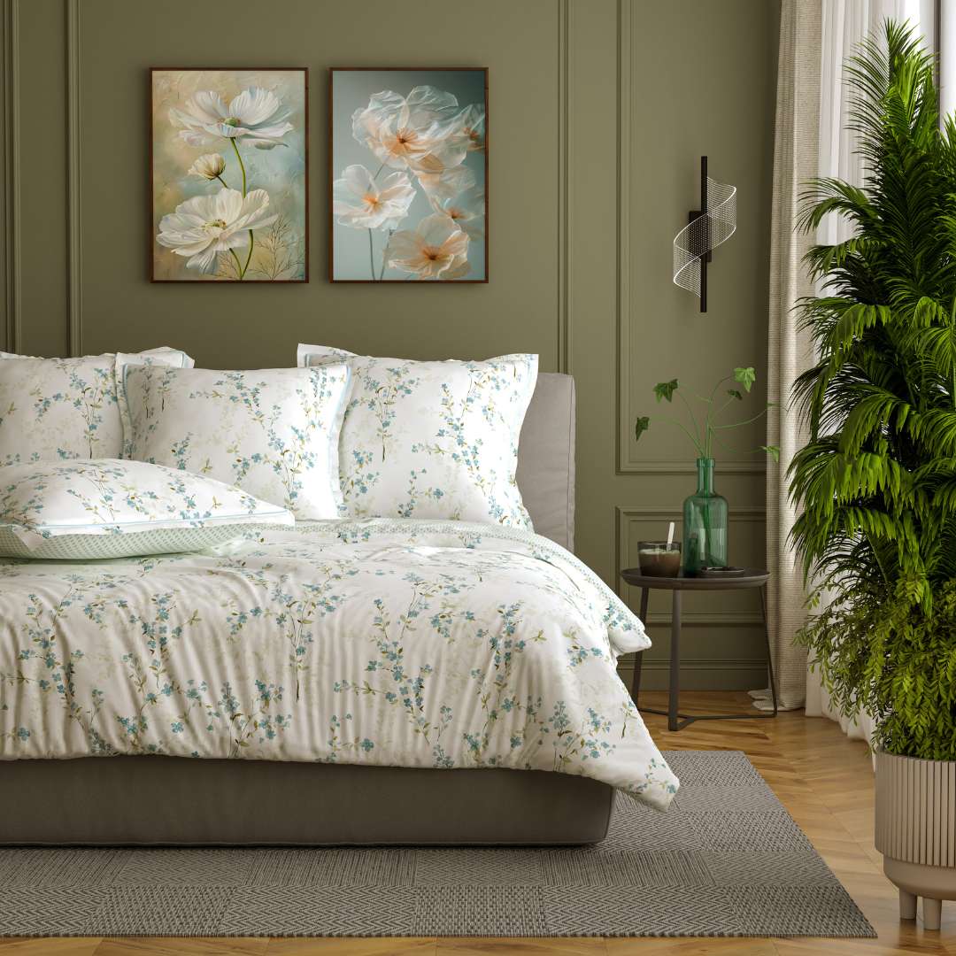 Parure de couette en coton présentée dans une chambre décoration moderne ton vert